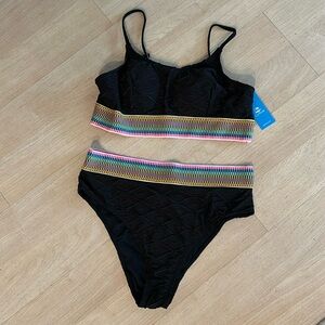Bikini, brand new with tags, never worn. Black with colorful edging